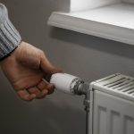man-turning-off-radiator-energy-crisis (1)